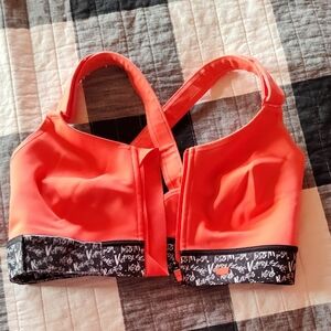 Vibrant Orange SheFit Sports Bra with Black and White Trim, Fully Adjustable